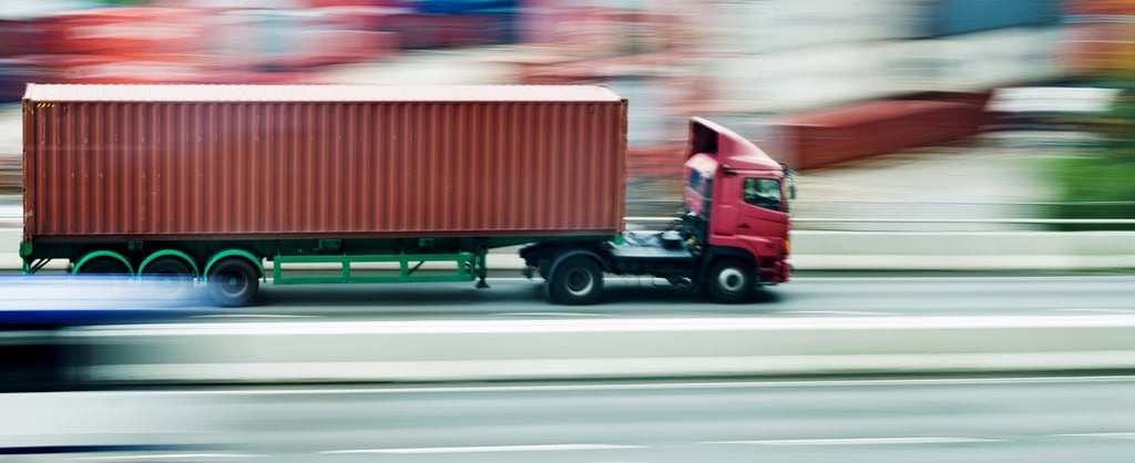 Container truck in motion